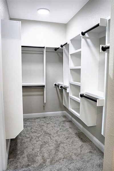 Spacious custom closet system.