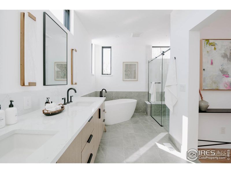 Enjoy ultimate privacy without losing natural light in this generous primary bath.