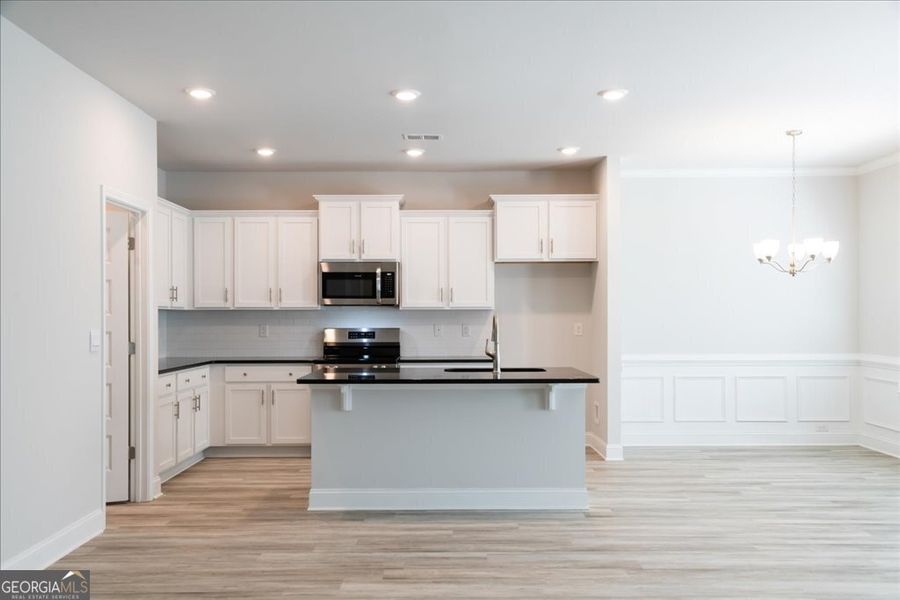 Furnished interior view inside a new home in Oakview Estates, Macon (Image 6).