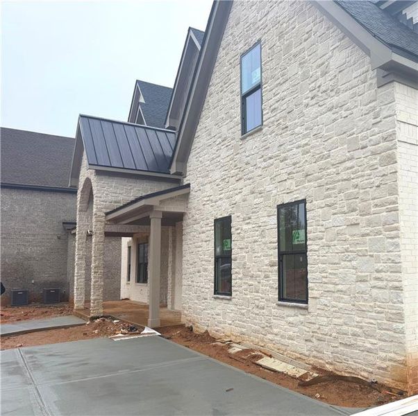 Exterior details and patio area of a home in , Buford (Image 2). Exterior details and patio area of a home in , Buford (Image 2).