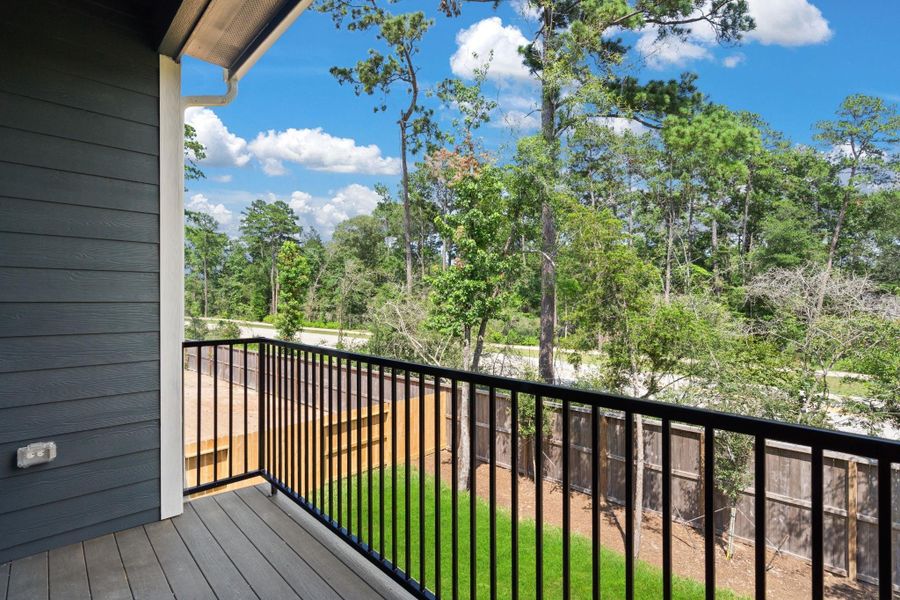 Exterior details and patio area of a home in The Woodlands Hills, Willis (Image 3).