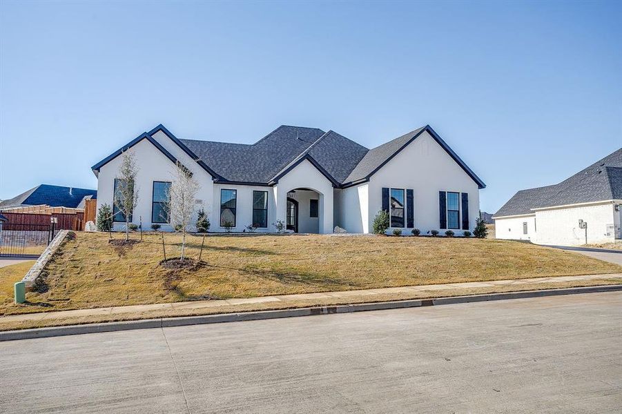 Front exterior of a new home in Whitestone Heights, Benbrook, TX, highlighting curb appeal (Image 26).