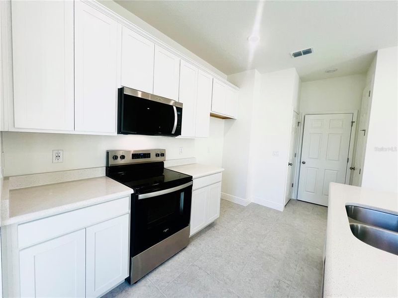 Furnished interior view inside a new home in Palm Coast: Cornerstone Collection, Palm Coast (Image 8).