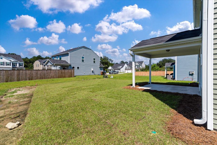 Front exterior of a new home in Oakley Pointe, Moncks Corner, SC, highlighting curb appeal (Image 28).