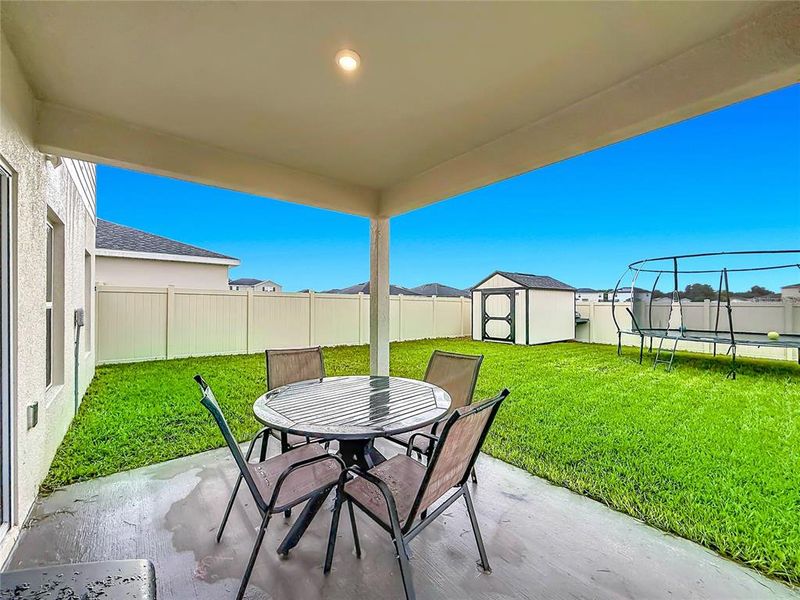 Exterior details and patio area of a home in , Sumterville (Image 25).