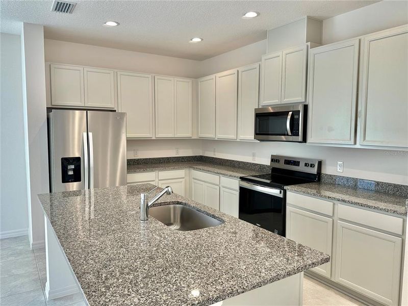 Furnished interior view inside a new home in , St. Cloud (Image 5). Furnished interior view inside a new home in , St. Cloud (Image 5).