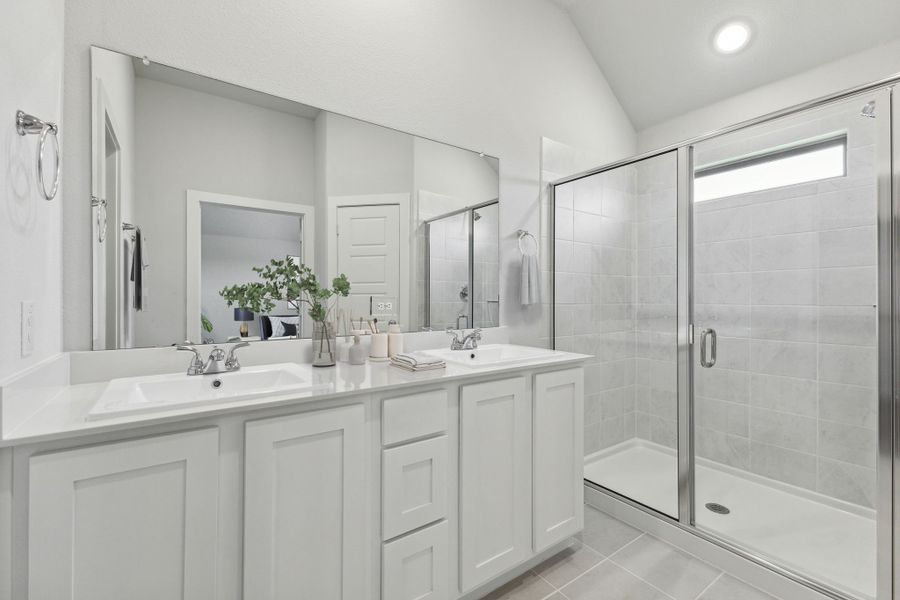 Primary bathroom in the Amber home plan by Trophy Signature Homes – REPRESENTATIVE PHOTO Primary bathroom in the Amber home plan by Trophy Signature Homes – REPRESENTATIVE PHOTO