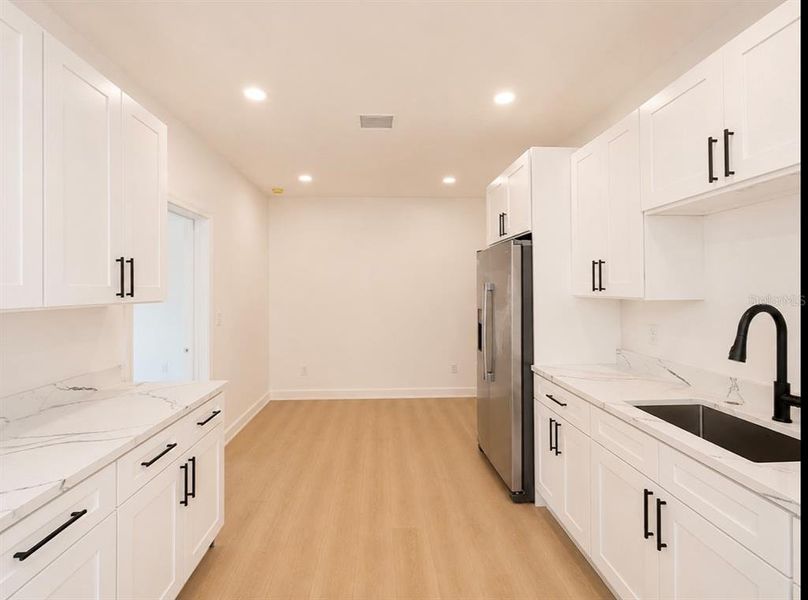 Furnished interior view inside a new home in , Brooksville (Image 8).