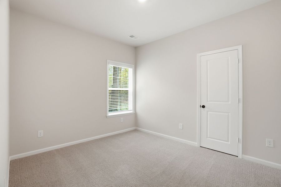 Representative unfurnished interior of a home built from the Magnolia Select M by McGuinn Homes in Broadway Lake, Anderson (Image 18).