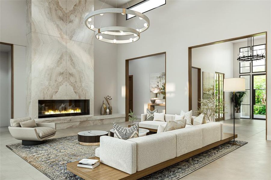 Grand living space featuring a floor-to-ceiling stone fireplace, high ceilings, and recessed lighting