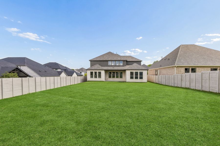 Exterior details and patio area of a home in Painted Tree Lakeside, McKinney (Image 4).