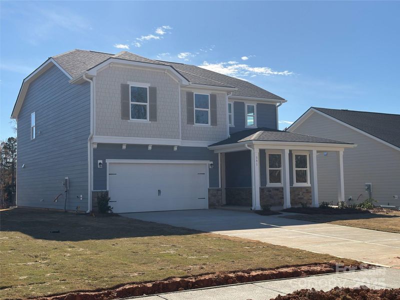 Front exterior of a new home in , Denver, NC, highlighting curb appeal (Image 1).