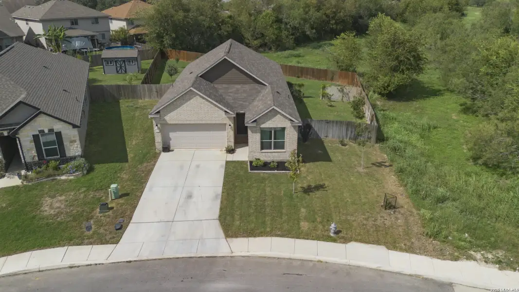 Front exterior of a new home in , San Antonio, TX, highlighting curb appeal (Image 26).
