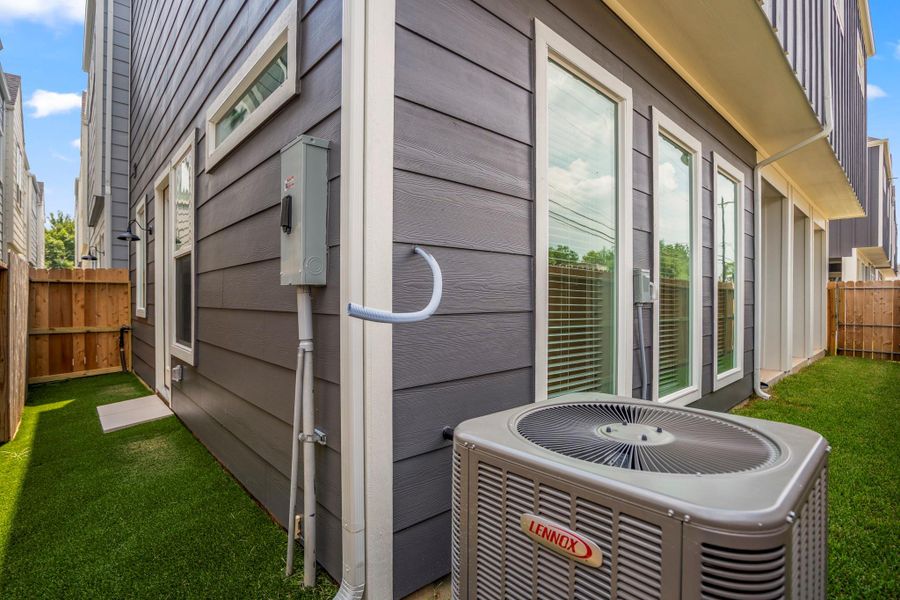 Exterior details and patio area of a home in , Houston (Image 26).