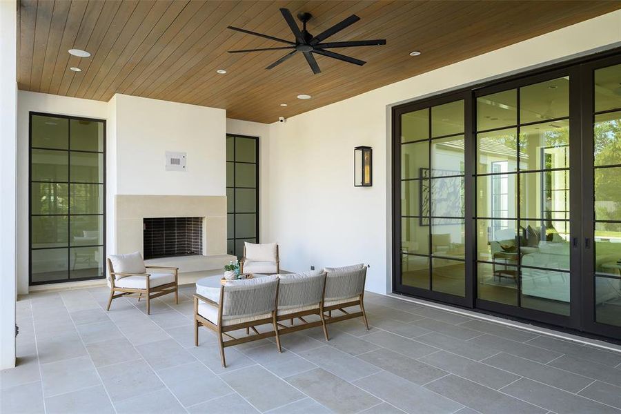 View of patio / terrace with ceiling fan, french doors, and outdoor lounge area View of patio / terrace with ceiling fan, french doors, and outdoor lounge area