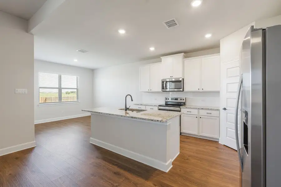 Furnished interior view inside a new home in Canyon Ranch, Jarrell (Image 3).