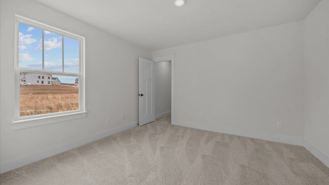 Representative unfurnished interior of a home built from the Beramont by DRB Homes in Pleasant Falls, Moore (Image 32).