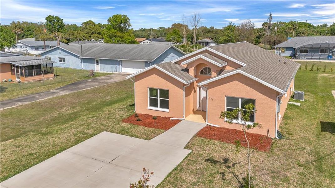 Front exterior of a new home in , New Smyrna Beach, FL, highlighting curb appeal (Image 16). Front exterior of a new home in , New Smyrna Beach, FL, highlighting curb appeal (Image 16).