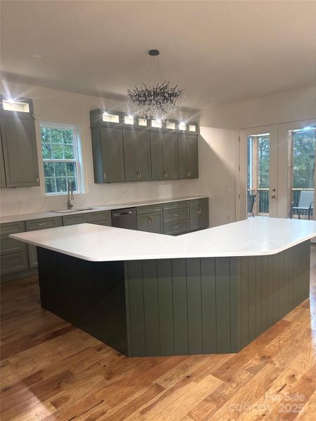 Kitchen island w/ lighted top cabinets Kitchen island w/ lighted top cabinets