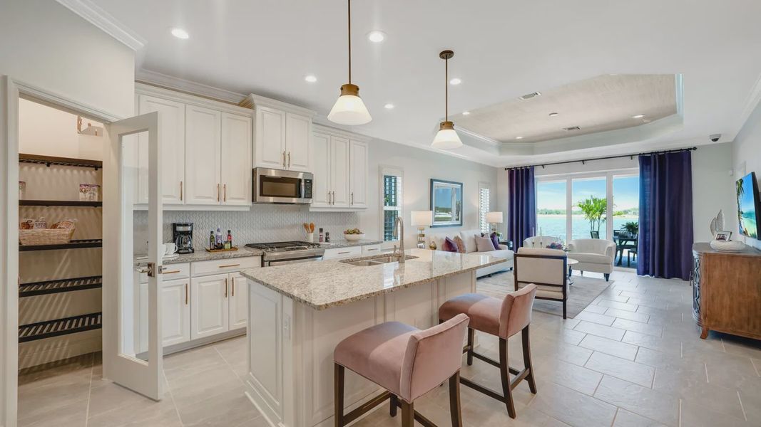 Representative furnished interior of a home built from the Dream 2 by Neal Communities in SkySail, Naples (Image 16).