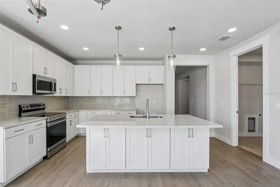 Furnished interior view inside a new home in Palm Coast Homes, Palm Coast (Image 5).
