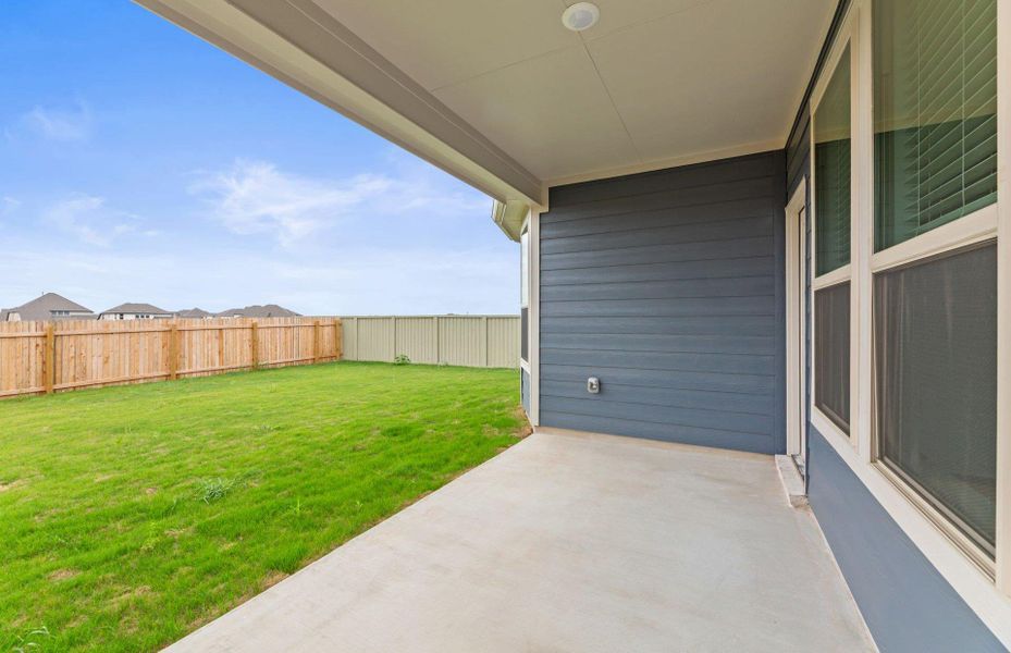 Front exterior of a new home in Santa Rita Ranch, Liberty Hill, TX, highlighting curb appeal (Image 19).