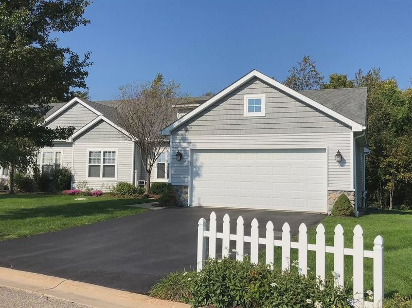 Front exterior of a new home in Mystic Ridge, Whitmore Lake, MI, highlighting curb appeal (Image 29).