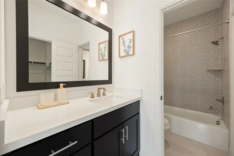 Furnished interior view inside a new home in Bridgeland, Cypress (Image 27).