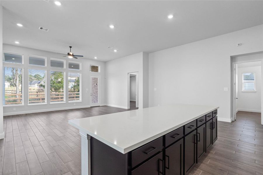 Experience effortless flow as the gourmet kitchen opens directly into the grand living space, perfect for keeping the conversation alive while prepping meals. Experience effortless flow as the gourmet kitchen opens directly into the grand living space, perfect for keeping the conversation alive while prepping meals.