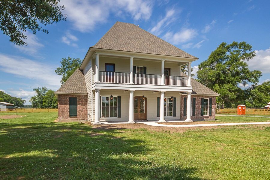 Representative exterior photo of a completed home built from the The Chateau French by Manuel Builders in Chapel Bend, Montgomery, TX (Image 2).