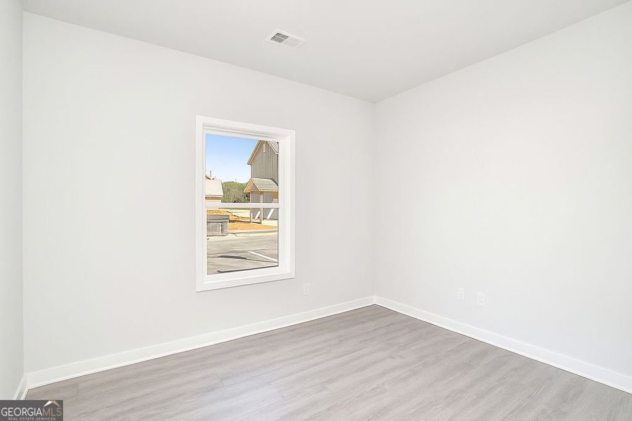 Spacious, unfurnished interior of a new home in The Cottages at East Lanier, Fayetteville (Image 9). Spacious, unfurnished interior of a new home in The Cottages at East Lanier, Fayetteville (Image 9).