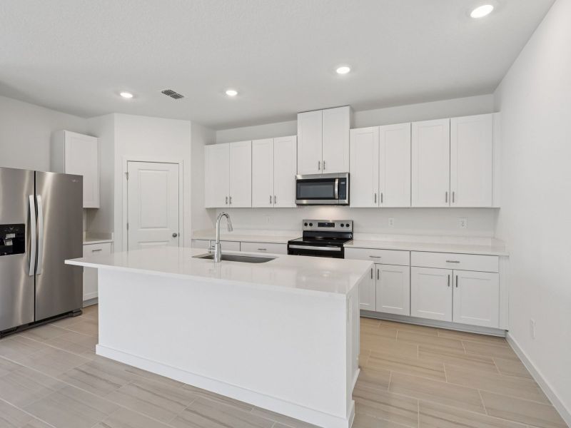 Furnished interior view inside a new home in Flagler Village - Signature Series, Palm Coast (Image 3).