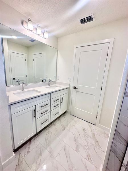 Furnished interior view inside a new home in Grasslands West, Lakeland (Image 7).