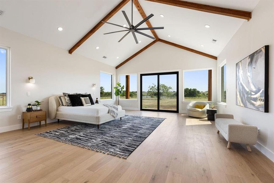 Bedroom with beam ceiling, high vaulted ceiling,
access to exterior, light wood-type flooring, and
recessed lighting Bedroom with beam ceiling, high vaulted ceiling,
access to exterior, light wood-type flooring, and
recessed lighting