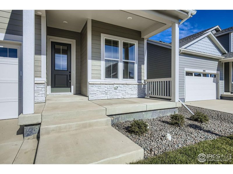 Exterior details and patio area of a home in Country Club Reserve – Fort Collins, Fort Collins (Image 3).