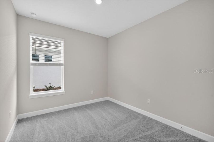Spacious, unfurnished interior of a new home in Esplanade at Wiregrass Ranch, Wesley Chapel (Image 24).
