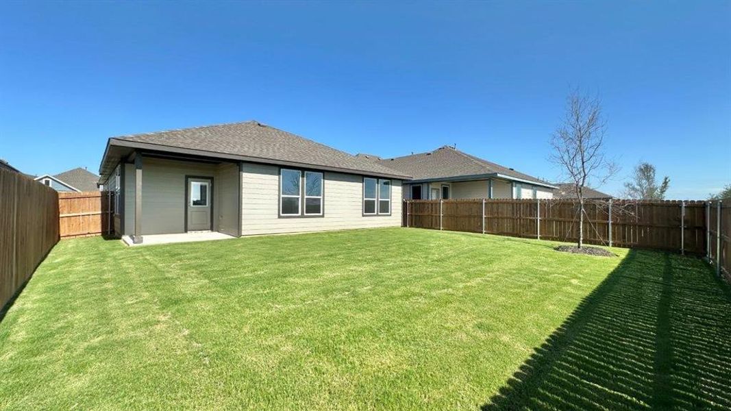 Front exterior of a new home in Rock Creek Ranch, Fort Worth, TX, highlighting curb appeal (Image 1). Front exterior of a new home in Rock Creek Ranch, Fort Worth, TX, highlighting curb appeal (Image 1).