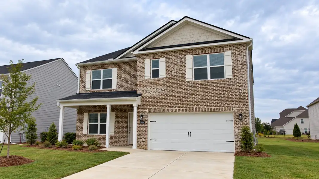 Front exterior of a new home in The Hideaway at Edgestone, Ooltewah, TN, highlighting curb appeal (Image 17).