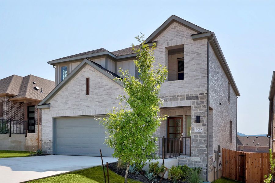 Front exterior of a new home in Lakeside at Tessera, Lago Vista, TX, highlighting curb appeal (Image 21).