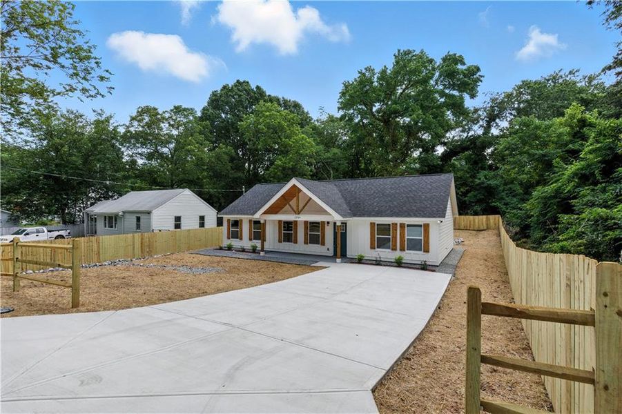 Front exterior of a new home in , Marietta, GA, highlighting curb appeal (Image 14).