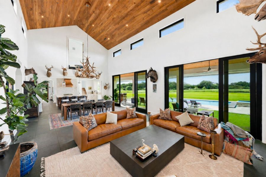 Spacious living room with pool view