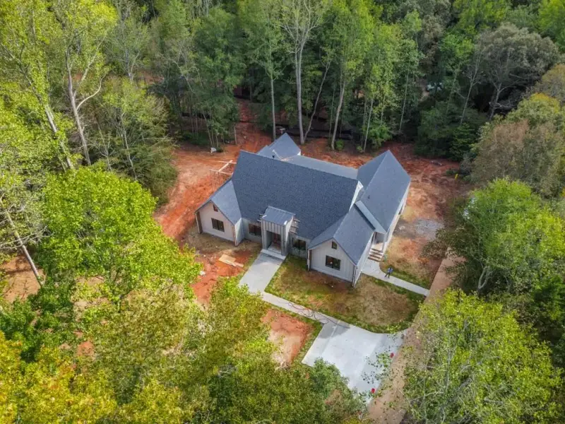 Front exterior of a new home in , Cumming, GA, highlighting curb appeal (Image 3). Front exterior of a new home in , Cumming, GA, highlighting curb appeal (Image 3).