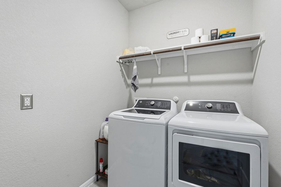 Laundry room with washing machine and clothes dryer Laundry room with washing machine and clothes dryer