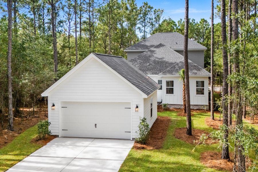 Front exterior of a new home in Harmony Township, Georgetown, SC, highlighting curb appeal (Image 2).