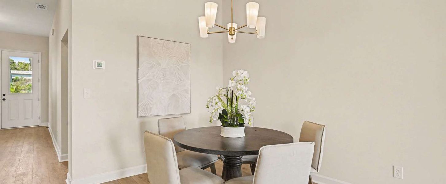 Representative furnished interior of a home built from the Sedona by Ashton Woods in Blue Heron Retreat, Little River (Image 10).
