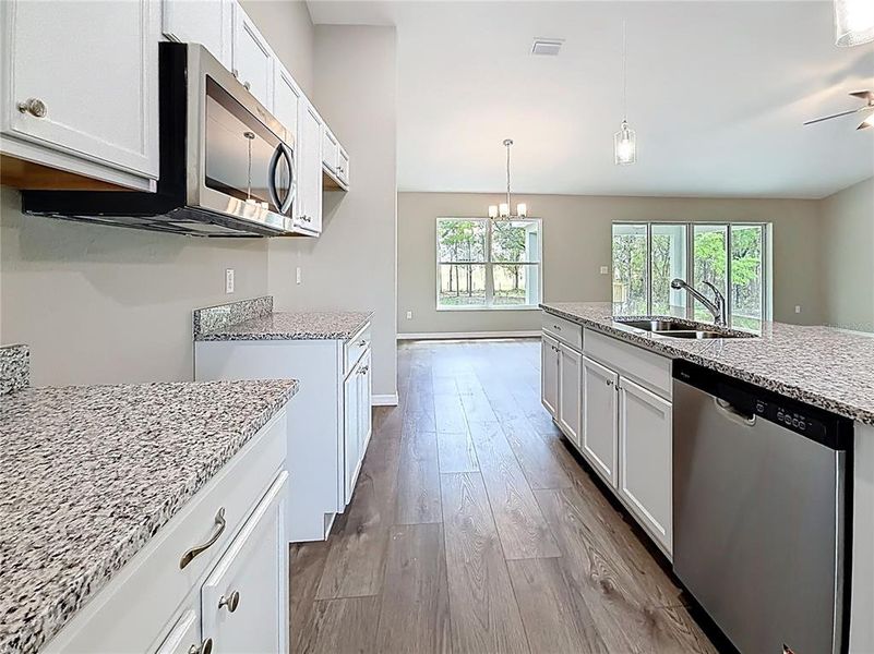 Furnished interior view inside a new home in , Dunnellon (Image 6).
