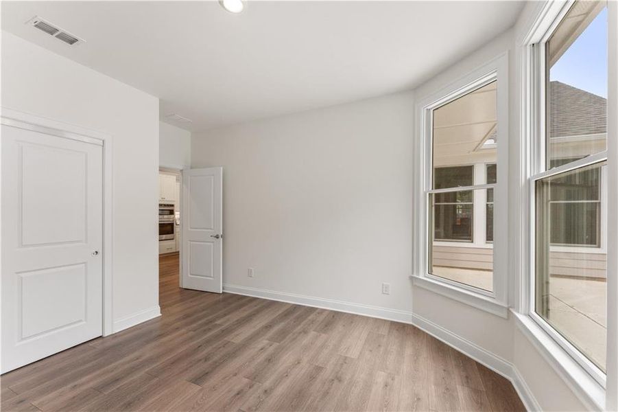 Spacious, unfurnished interior of a new home in The Courtyards at Bailey Farms, Dacula (Image 20).