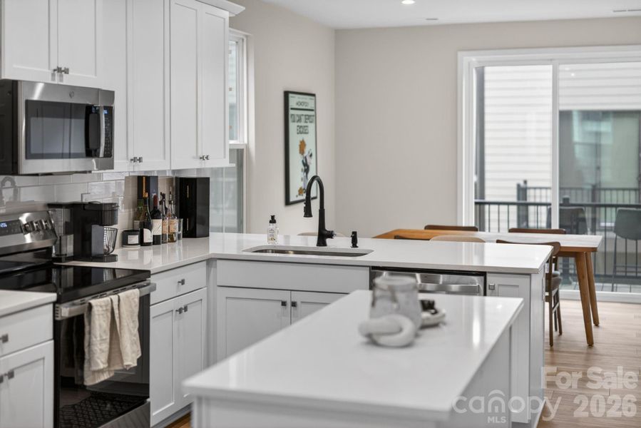 Kitchen island and ample cabinetry