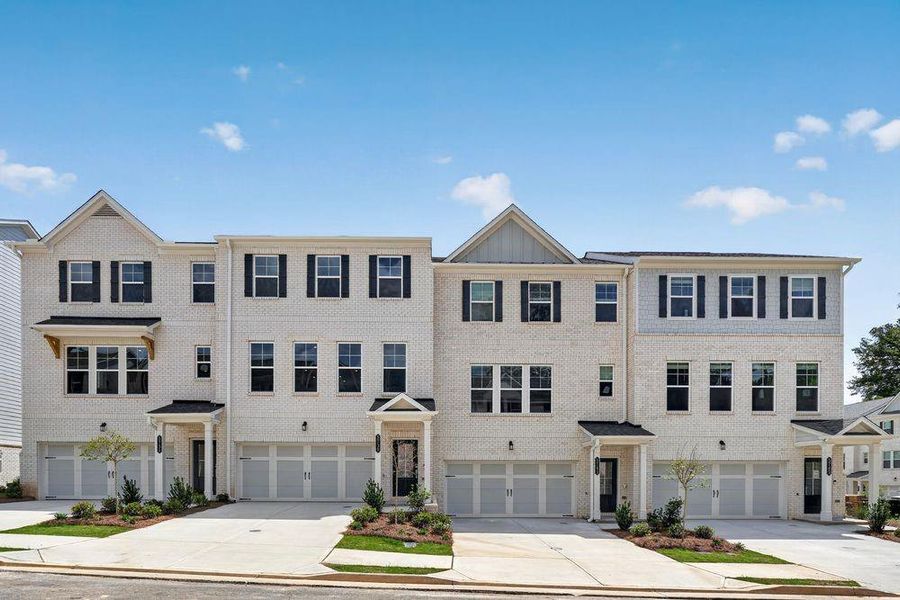 Front exterior of a new home in Somerset at Veterans Memorial, Mableton, GA, highlighting curb appeal (Image 1). Front exterior of a new home in Somerset at Veterans Memorial, Mableton, GA, highlighting curb appeal (Image 1).