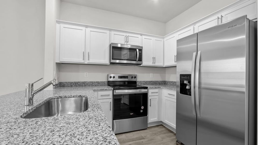 Furnished interior view inside a new home in The Townes at Ridgewood Farms, Winterville (Image 6).